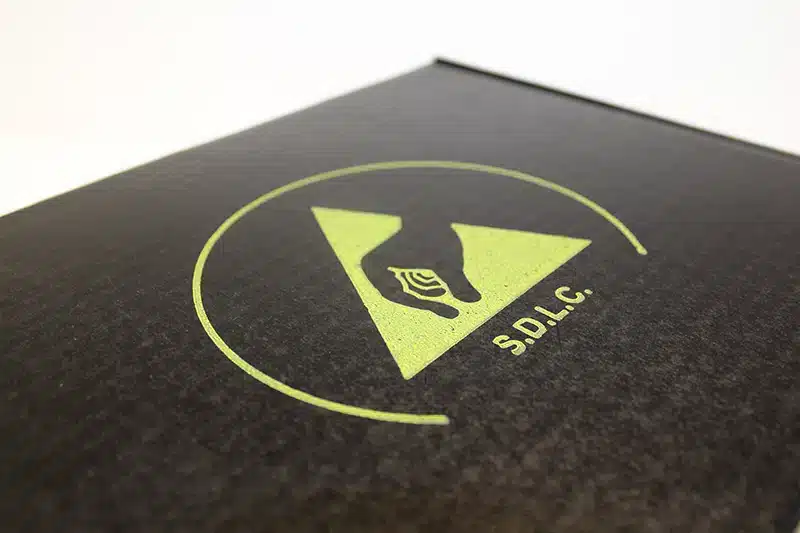 Corstat transit pack with closed lid featuring ESD protective symbol. Bondline.